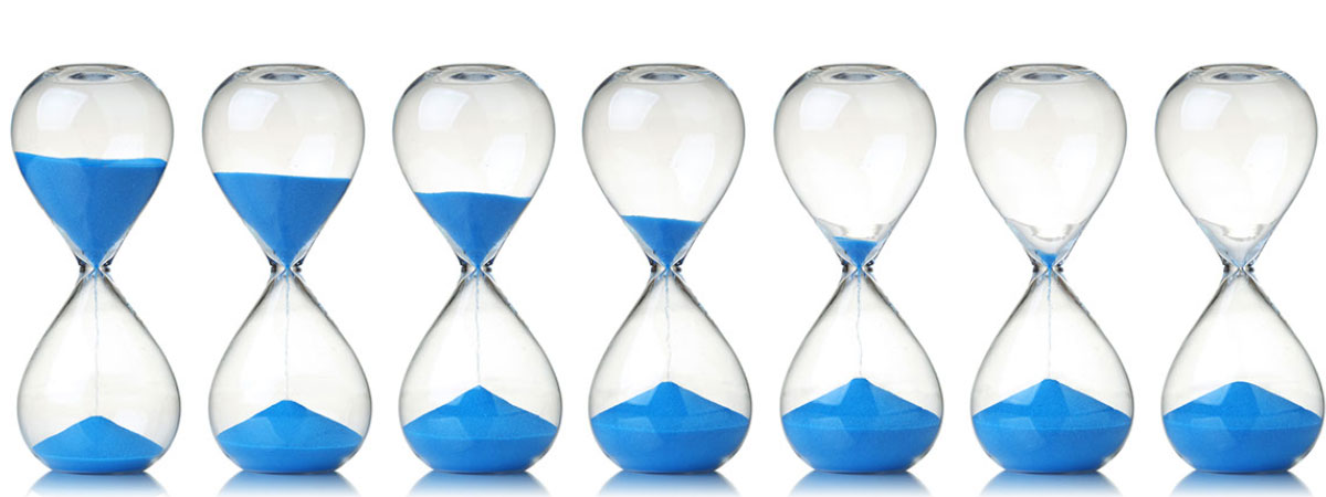 Hourglass with blue sand