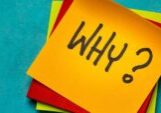 The word Why? written on Post-It notes.